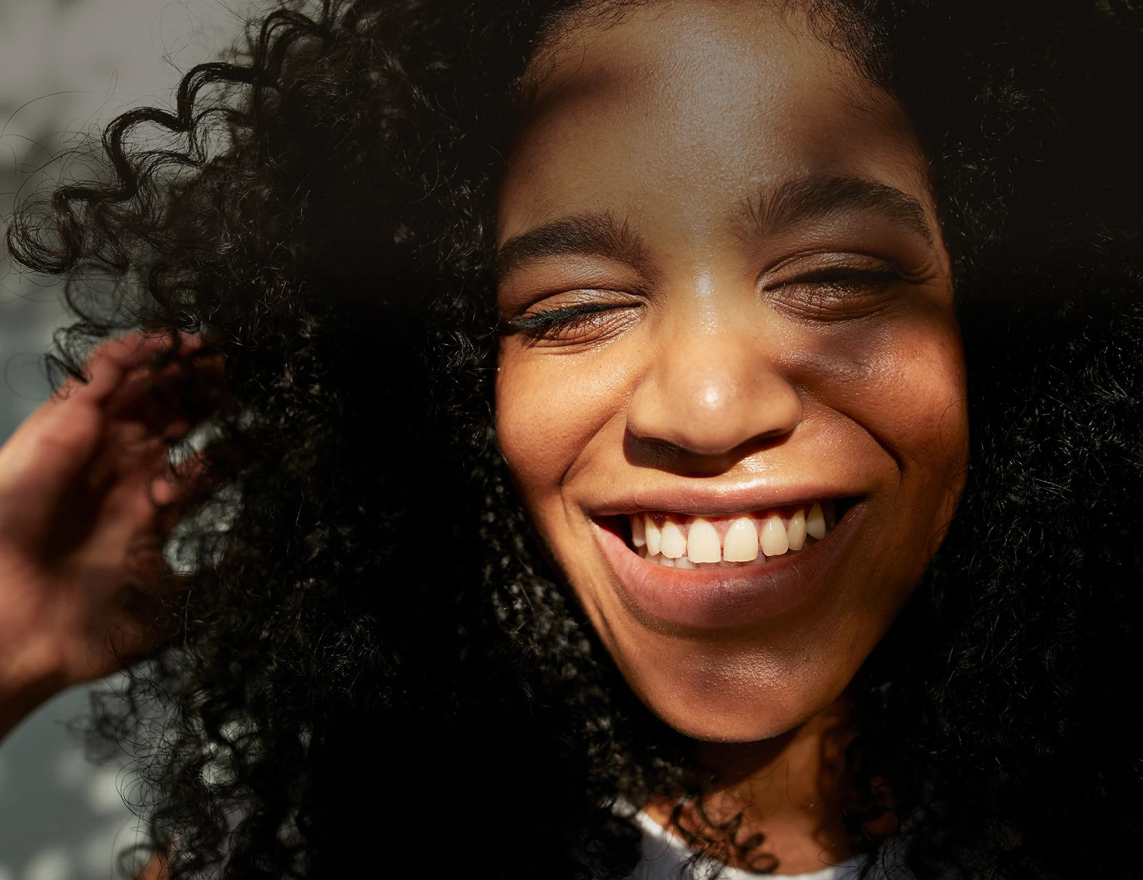 A woman smiling